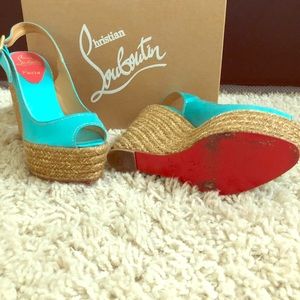 Christian Louboutin Size 38 Peep toe Wedge.